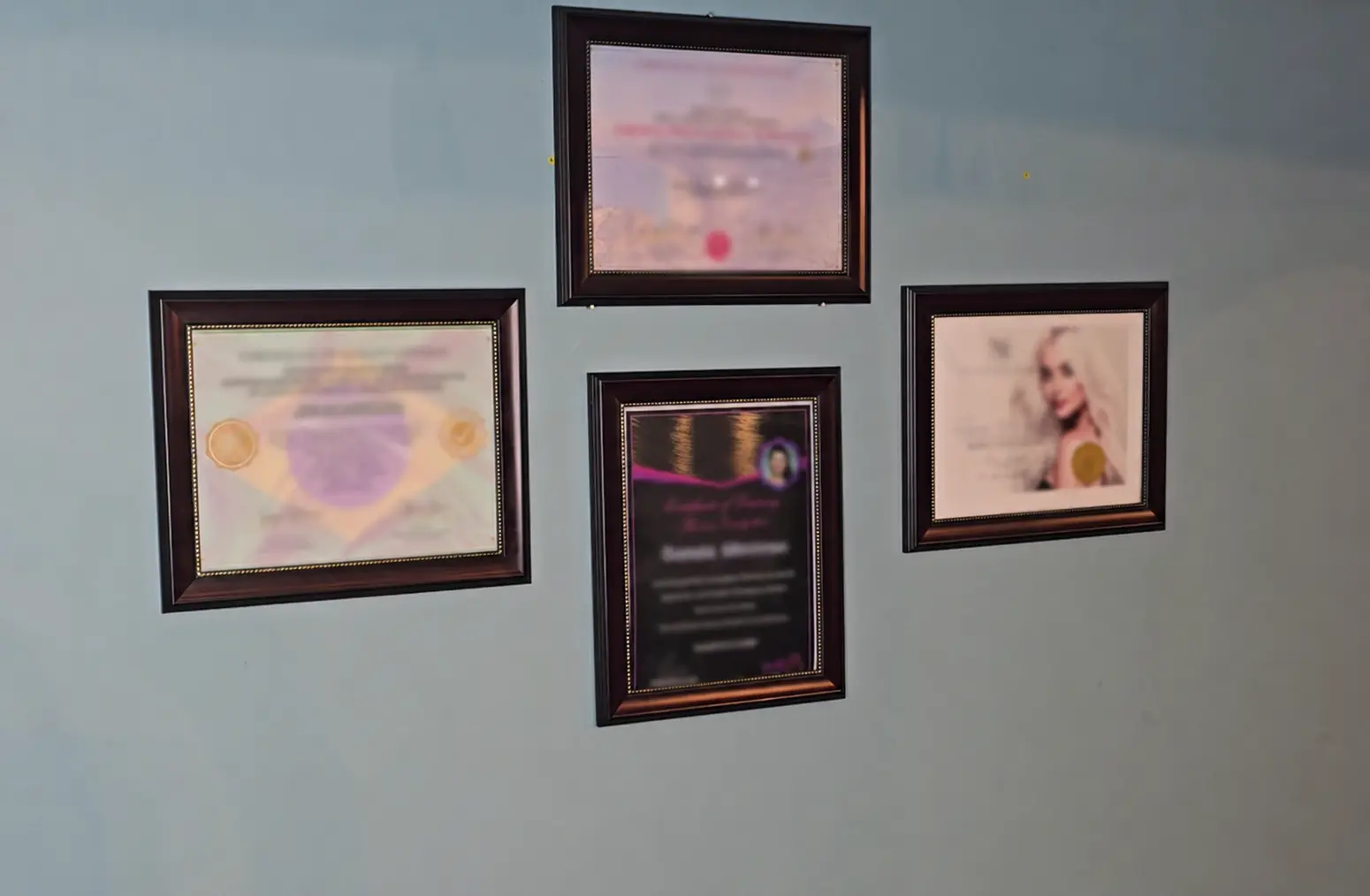 Professional hair-care certificates displayed at Sunni Beauty